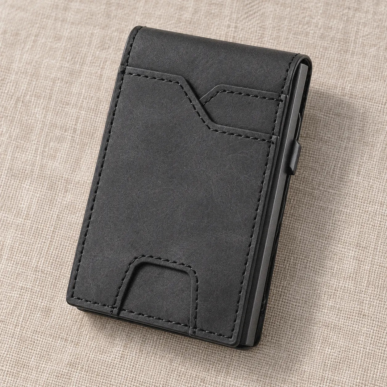 Close-up of the wallet lying on a linen surface